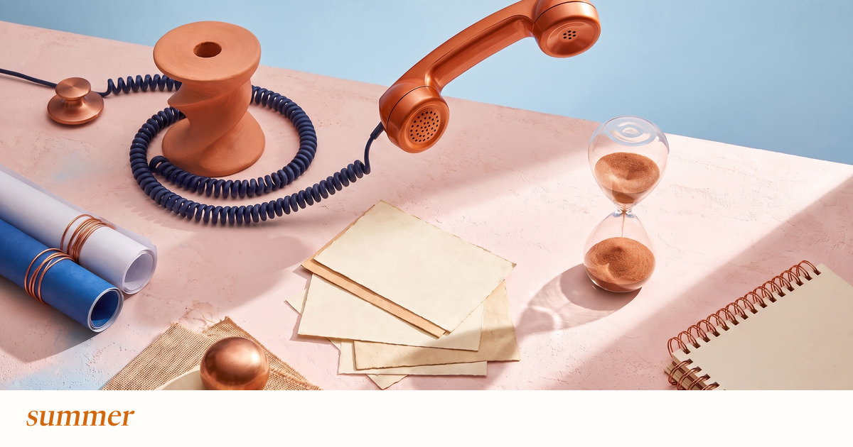Copper telephone, coiled cord and callback slips beside an hourglass, illustrating pharmacy phone tag.